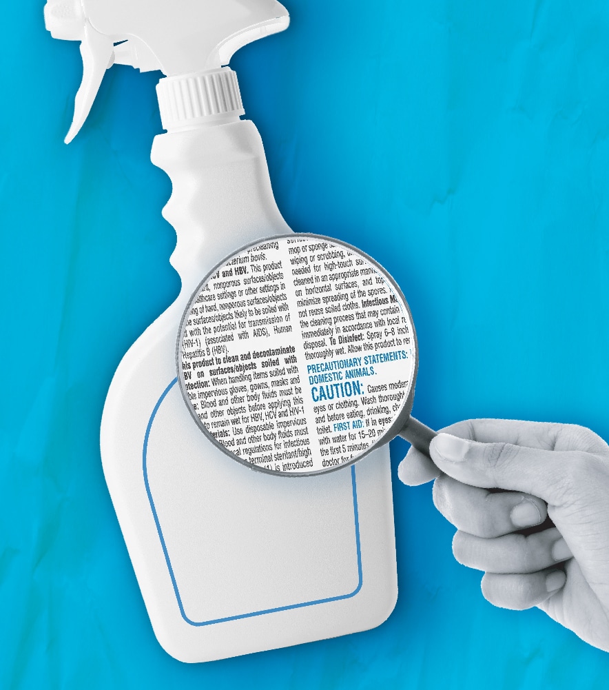 Spray bottle with a magnifying glass examining text