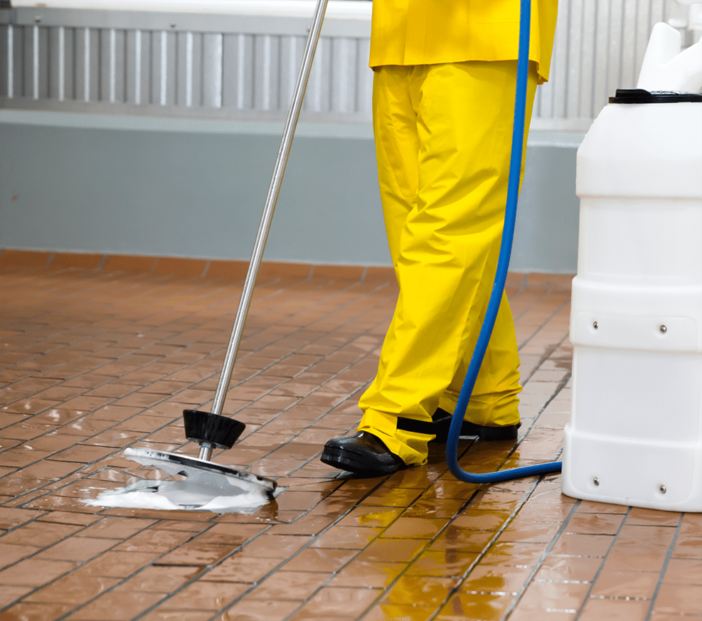 Close-up of drain being cleaned