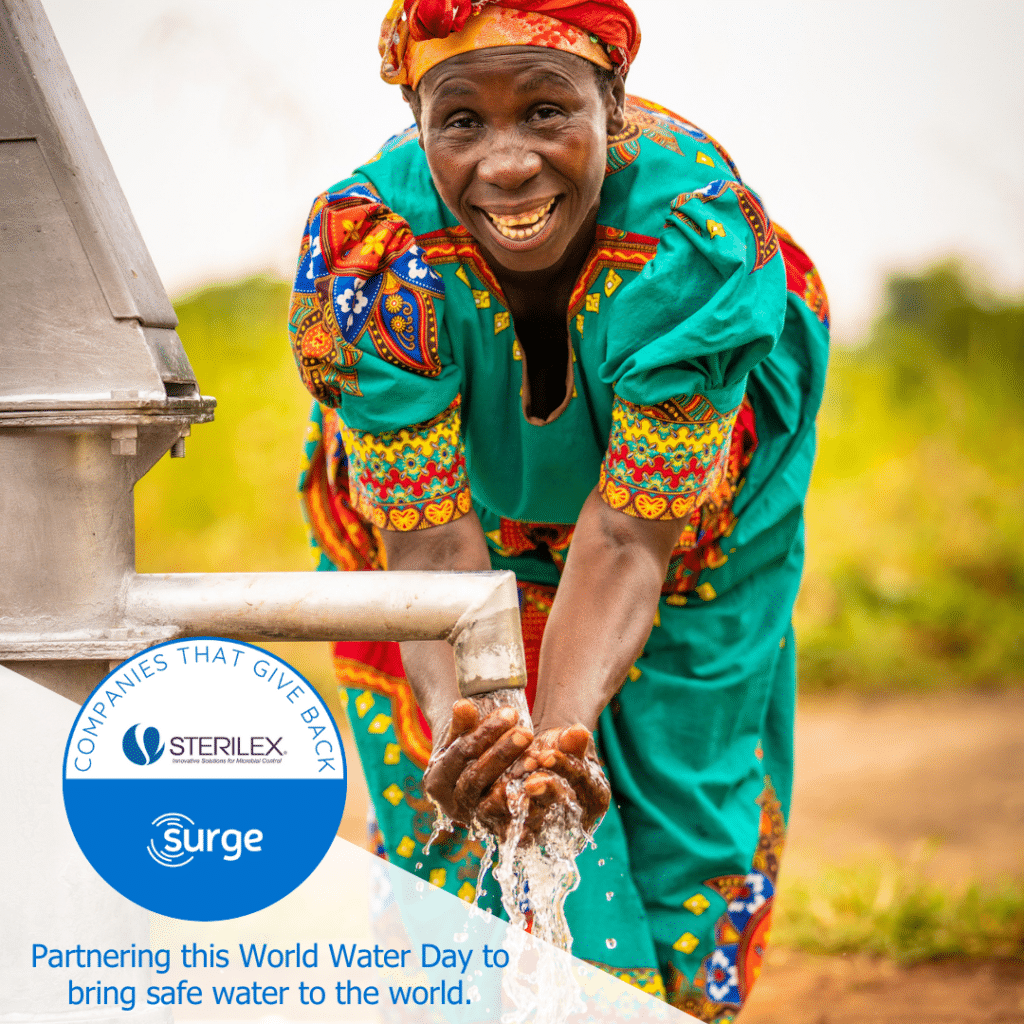 Woman at a well washing her hands. Badge showing Surge for Water World Water Day partnership with Sterilex.