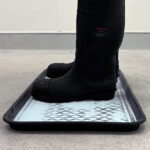 boots placed in ProvaStride footmat with product