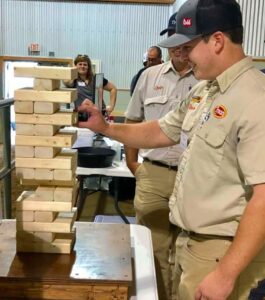 team members playing jenga