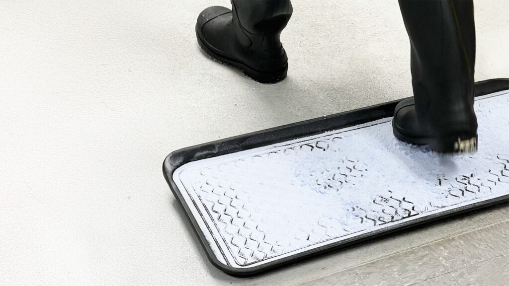 boots step in foot pan powder through doorway