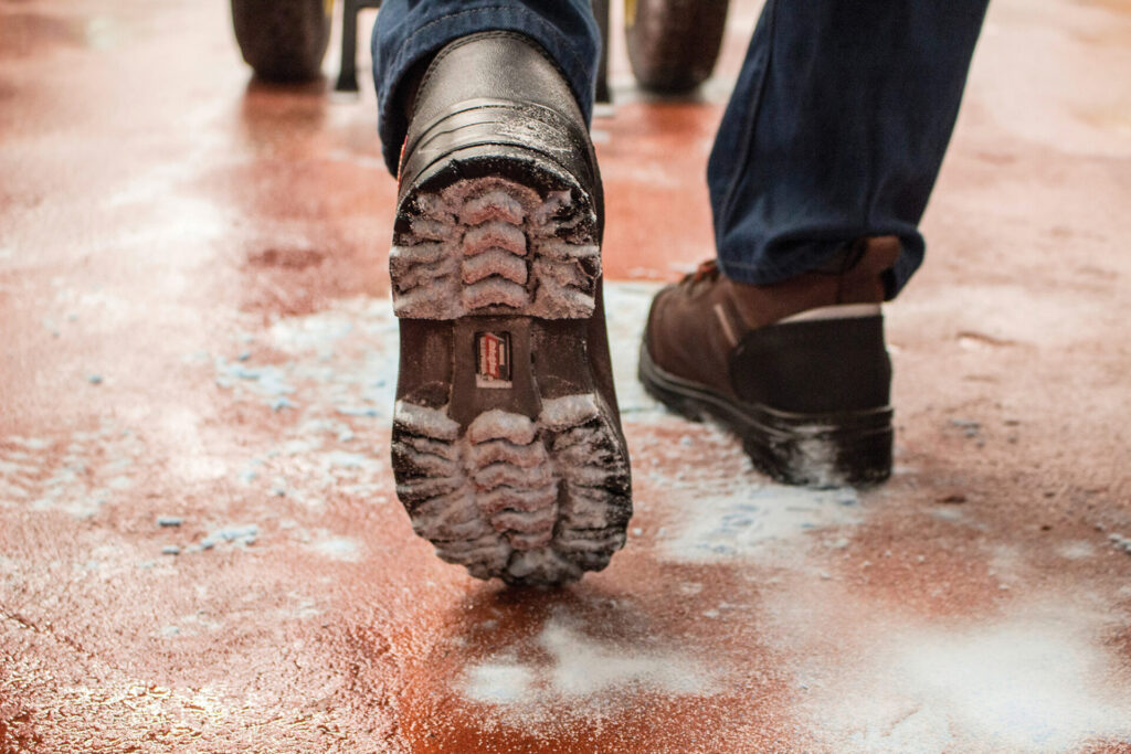 boots walking through sterilex powder on floor