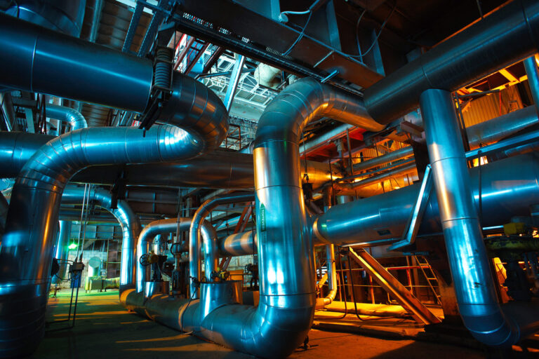closeup of large industrial piping in facility