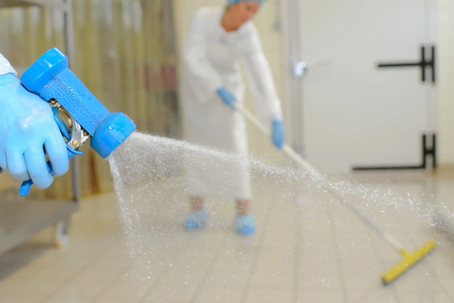 workers cleaning lab